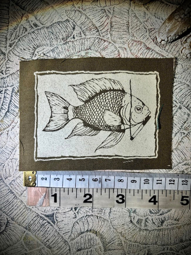 Fish smoking a cigarette patch