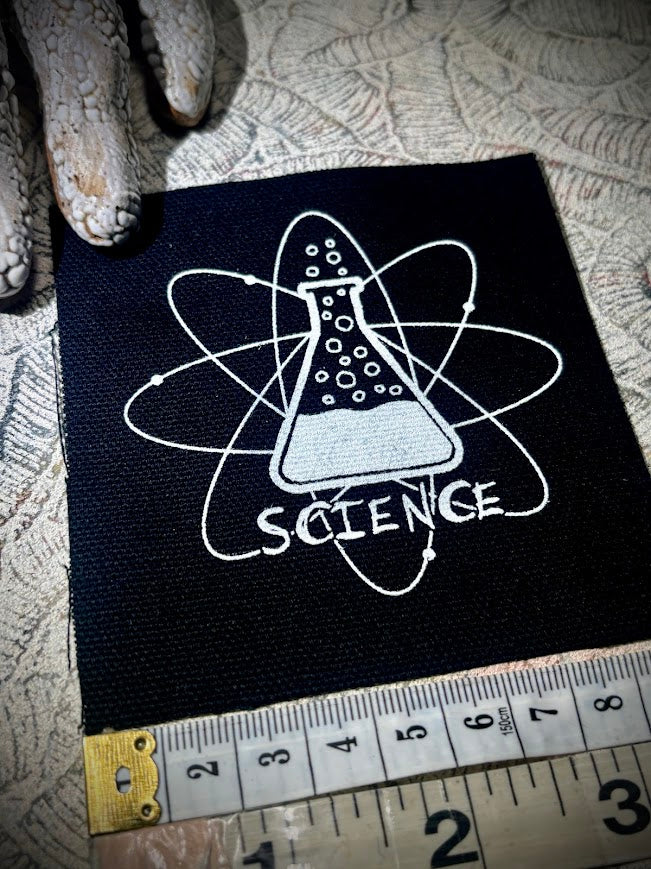 Science! sew on patch featuring bubbling science chemicals