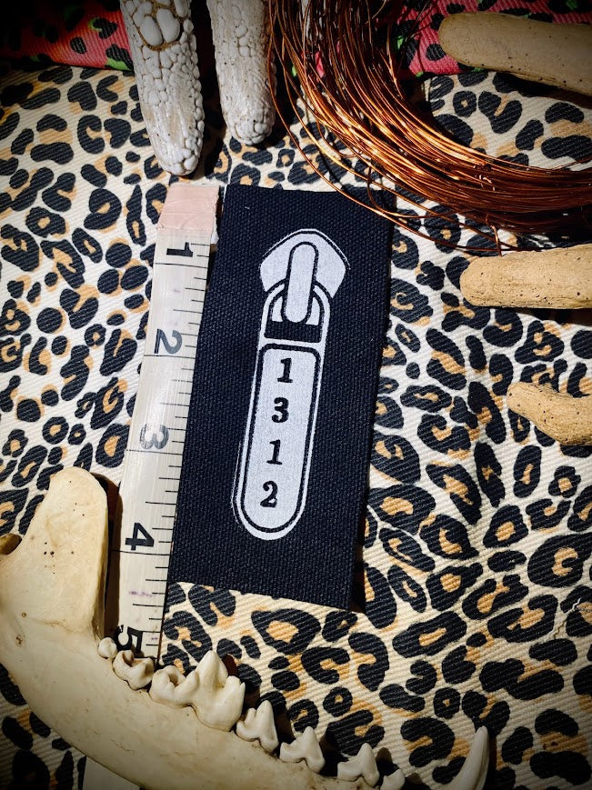 1312 ACAB zipper pull