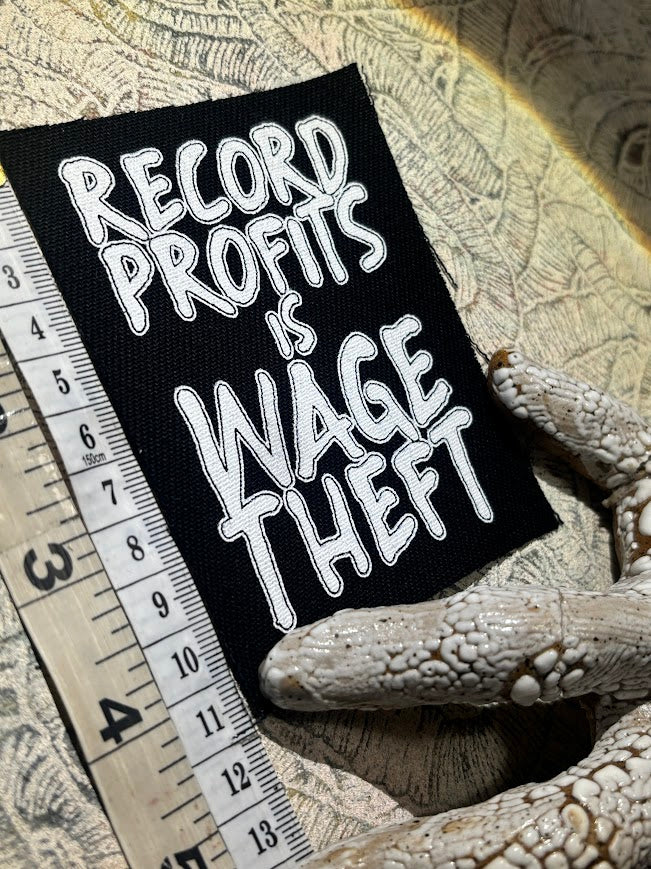 Record profits is wage theft. Sew on patch