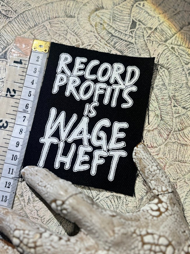 Record profits is wage theft. Sew on patch