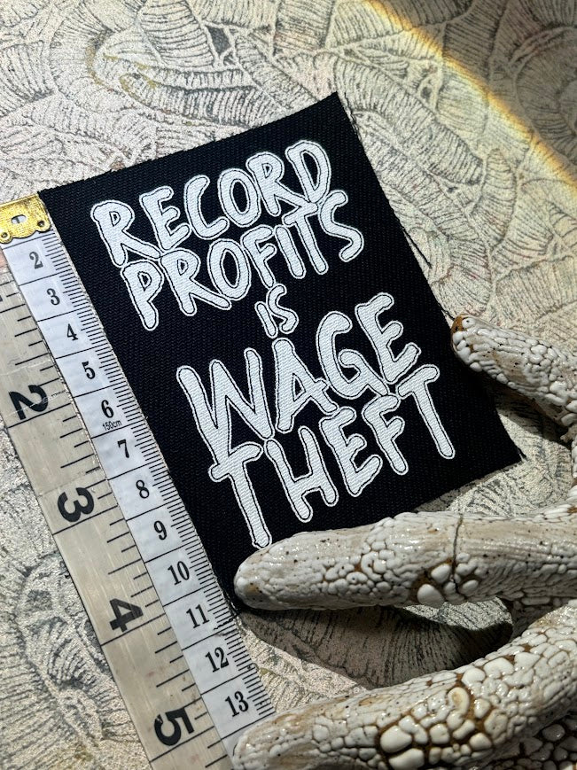 Record profits is wage theft. Sew on patch