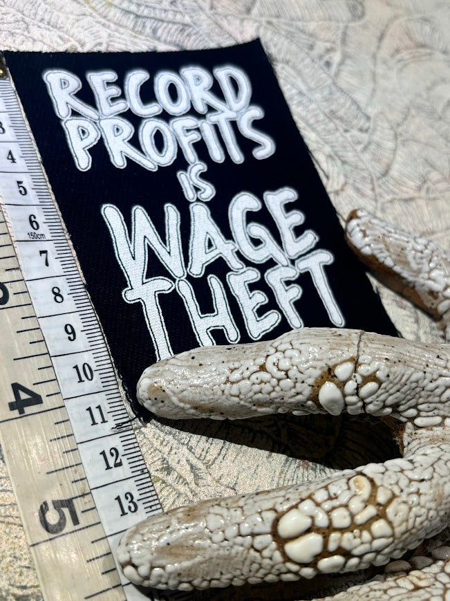 Record profits is wage theft. Sew on patch