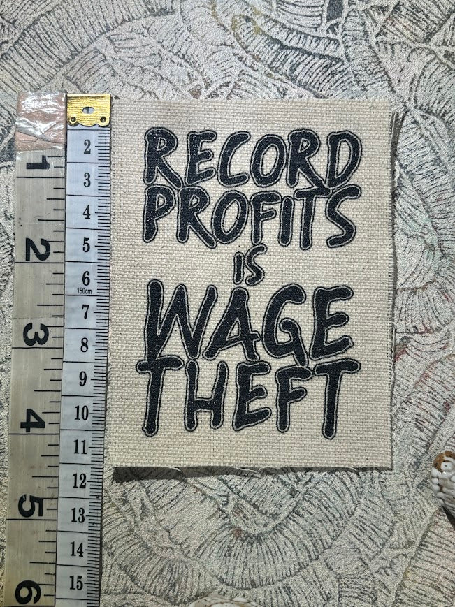 Record profits is wage theft. Sew on patch