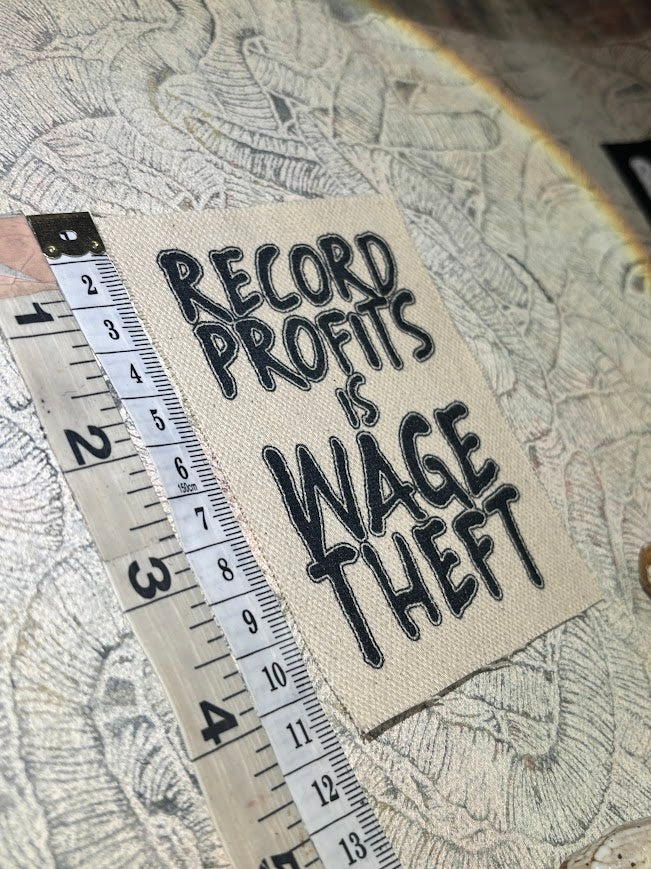 Record profits is wage theft. Sew on patch