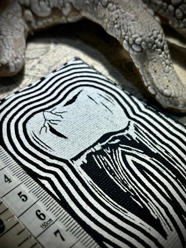 Tooth with a toothache patch.