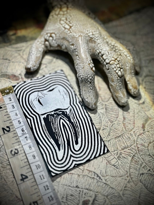 Tooth with a toothache patch