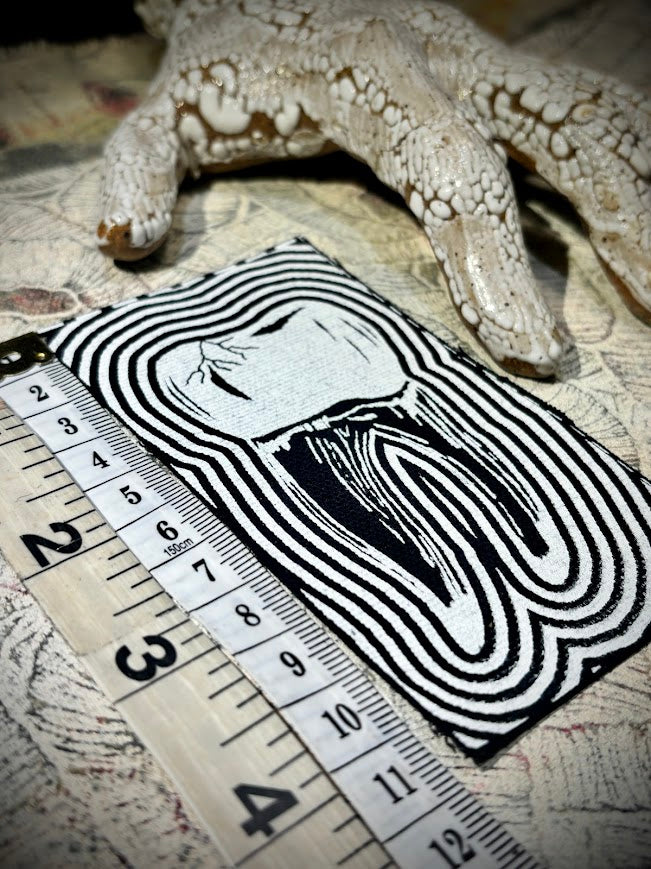 Tooth with a toothache patch.