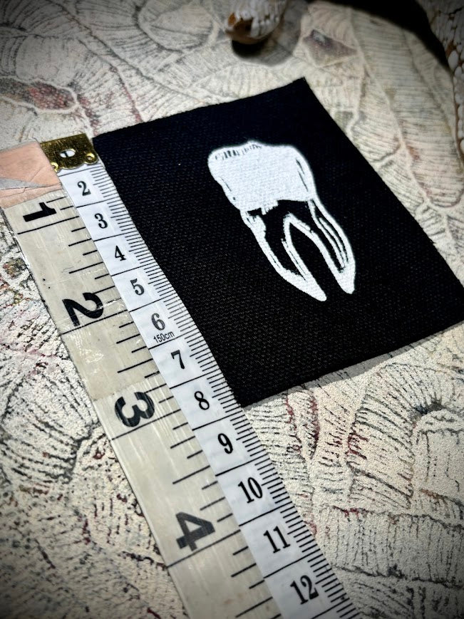 loose tooth patch. a mini patch.