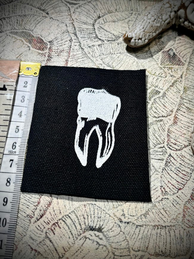 loose tooth patch. a mini patch.