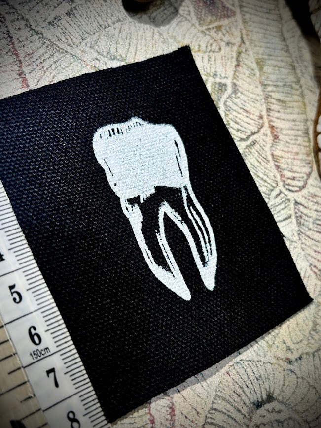 loose tooth patch. a mini patch.