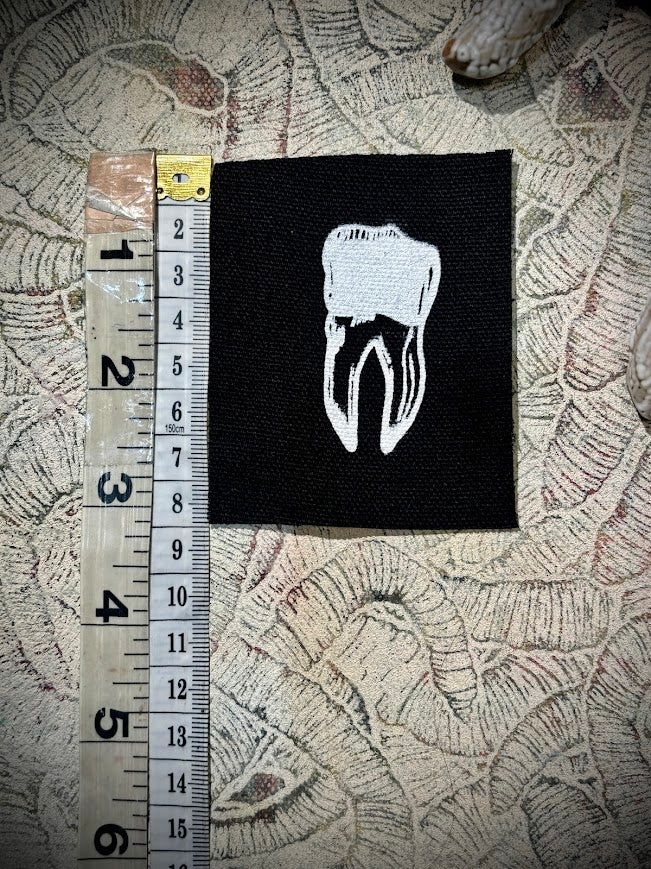 loose tooth patch. a mini patch.