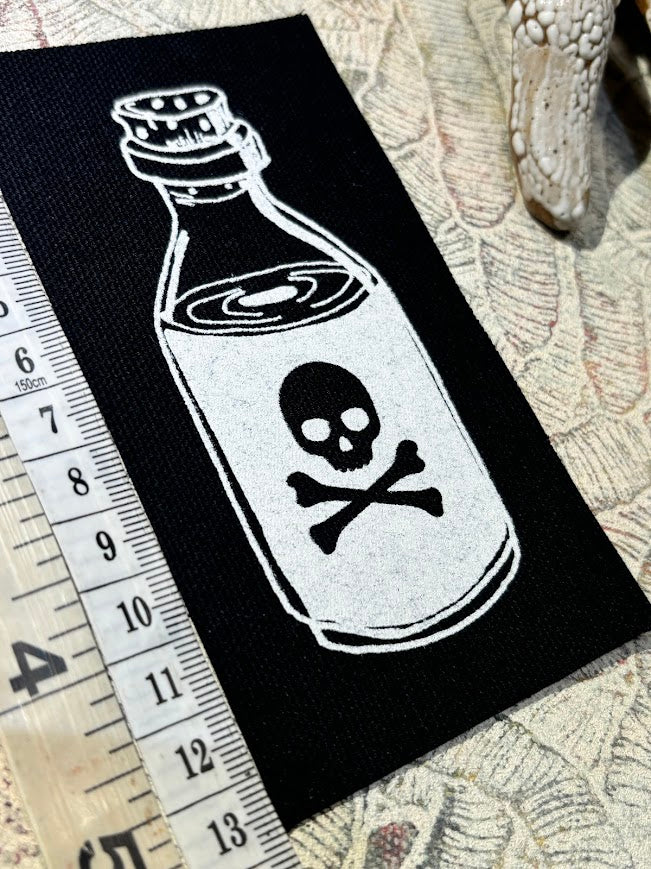 Little bottle of poison patch.