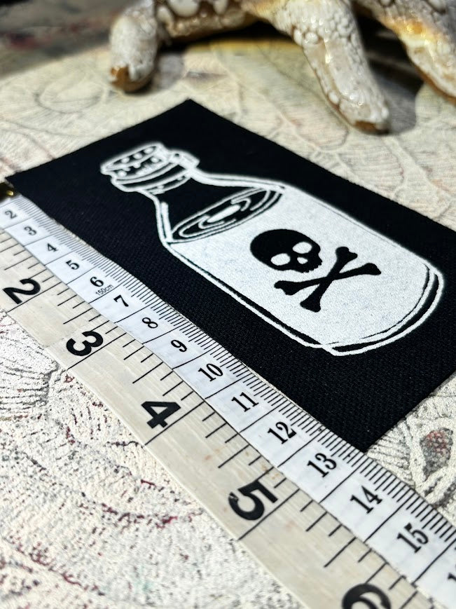 Little bottle of poison patch.