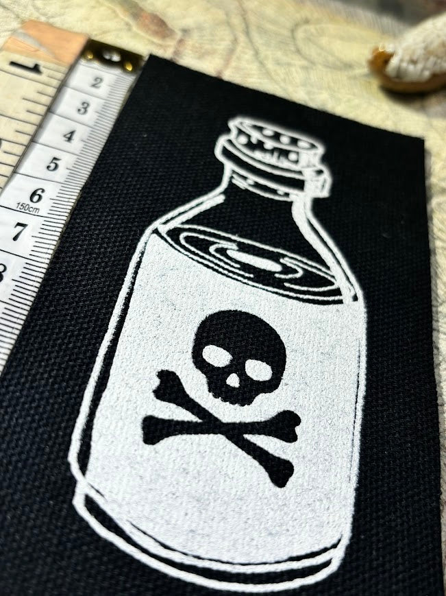 Little bottle of poison patch.