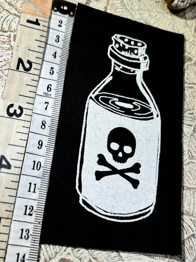 Little bottle of poison patch.