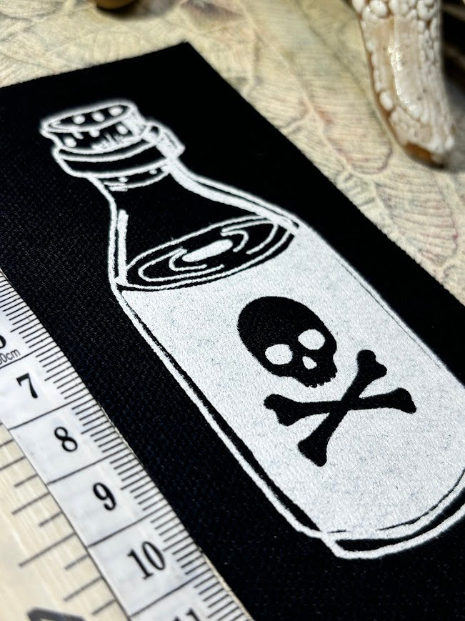 Little bottle of poison patch.