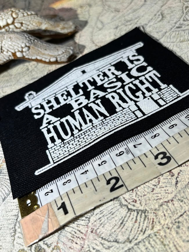 Shelter is a basic human right. sew on patch