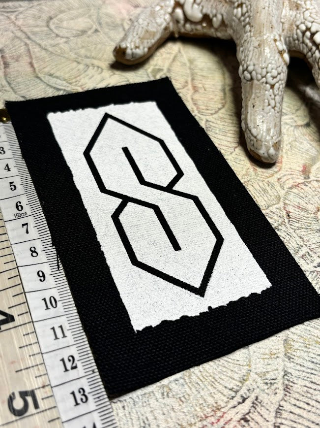 The cool S sew on patch.