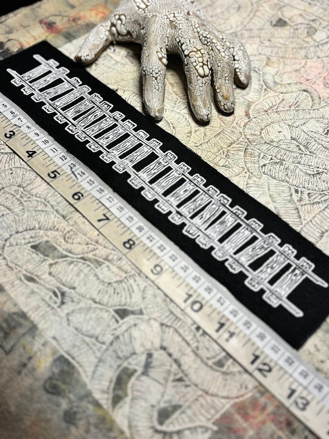 Train tracks patch. 11 inches long.