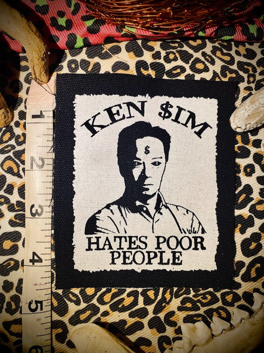 Ken Sim hates poor people sew on patch