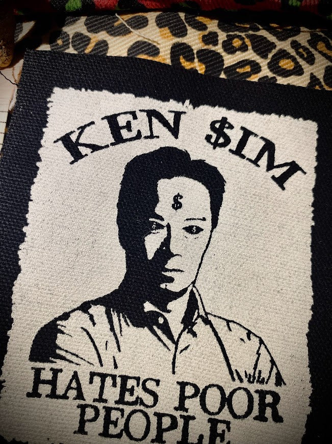 Ken Sim hates poor people sew on patch