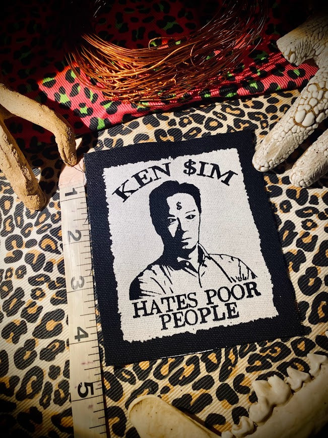 Ken Sim hates poor people sew on patch