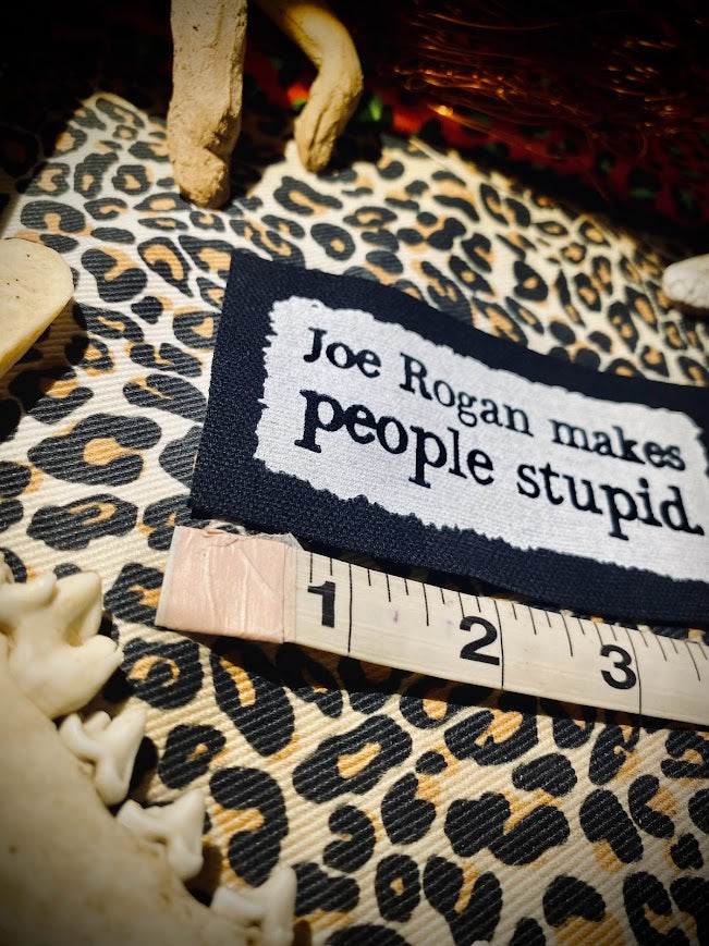 Joe Rogan makes people stupid sew on patch.