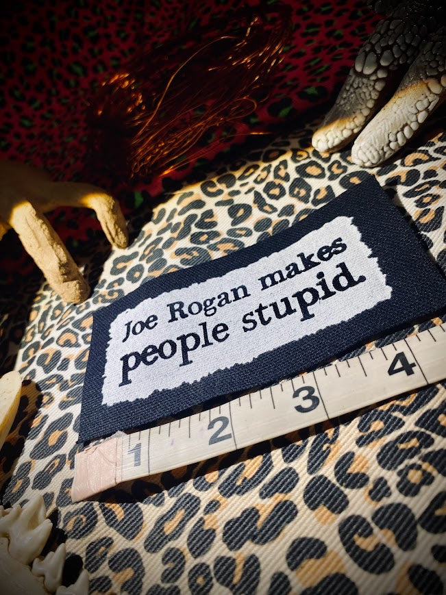 Joe Rogan makes people stupid sew on patch.