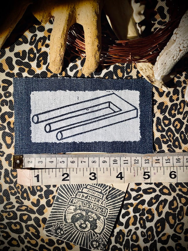 Impossible Trident sew on patch.