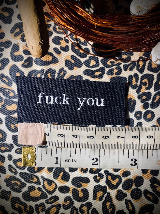 tiny fuck you sew on patch.