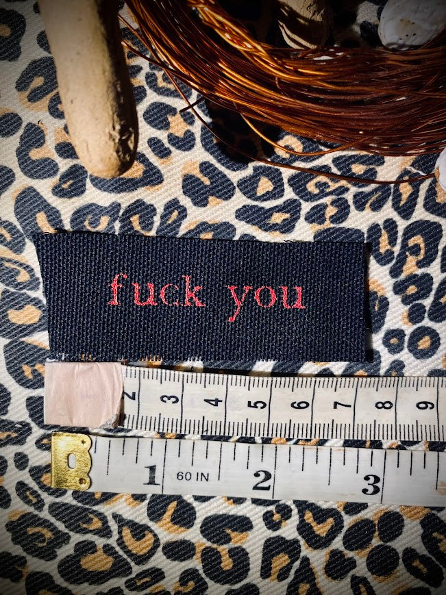 tiny fuck you sew on patch.