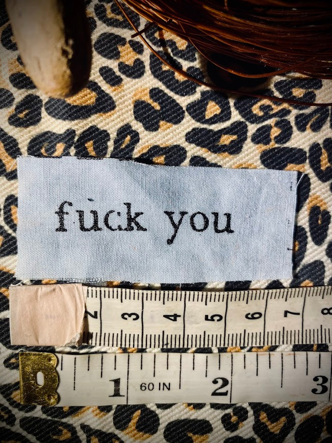 tiny fuck you sew on patch.