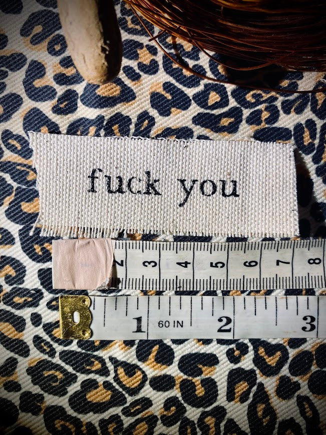 tiny fuck you sew on patch.