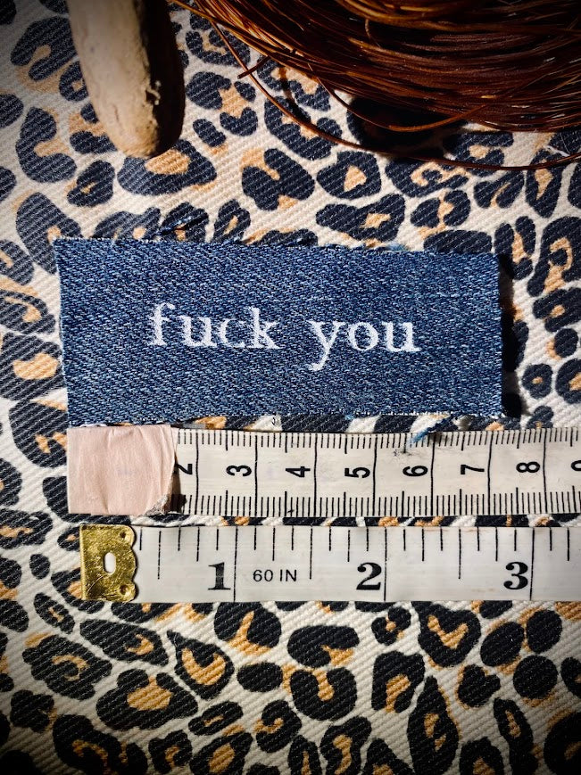 tiny fuck you sew on patch.