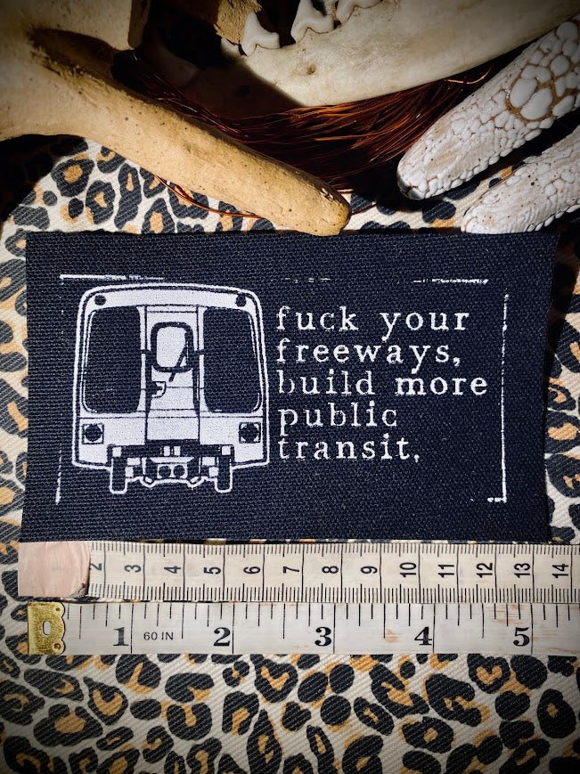 Fuck your freeways, build more public transit sew on patch.