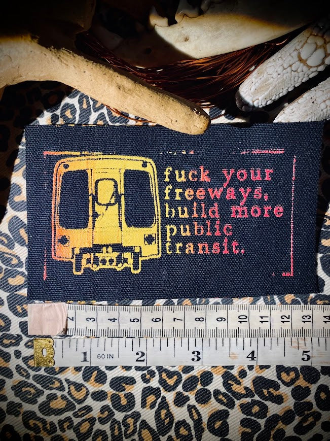 Fuck your freeways, build more public transit sew on patch.