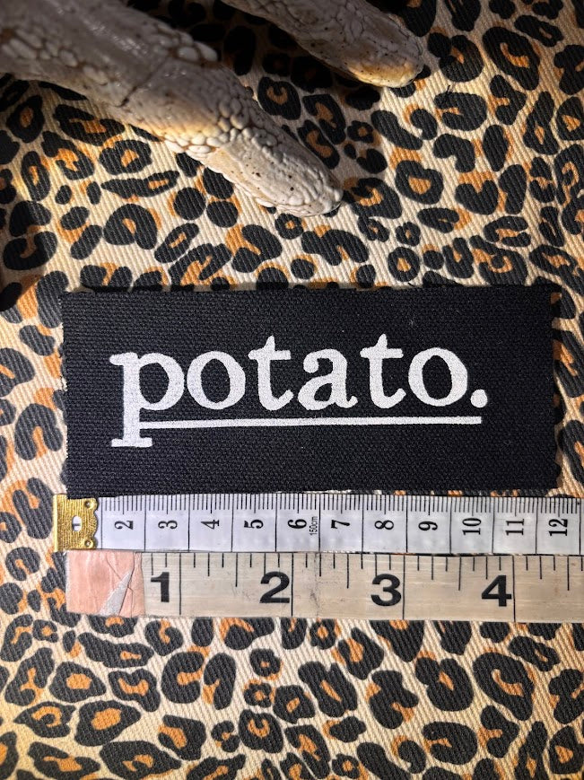 Potato patch. just a tiny patch that says potato.