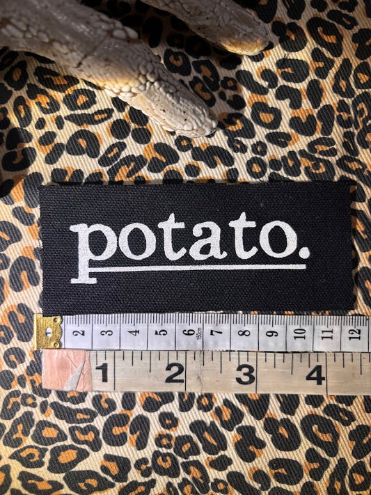 Potato patch. just a tiny patch that says potato.