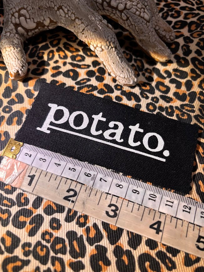 Potato patch. just a tiny patch that says potato