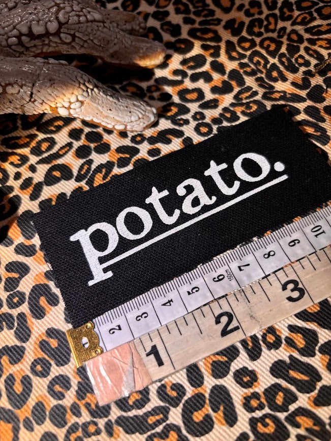 Potato patch. just a tiny patch that says potato