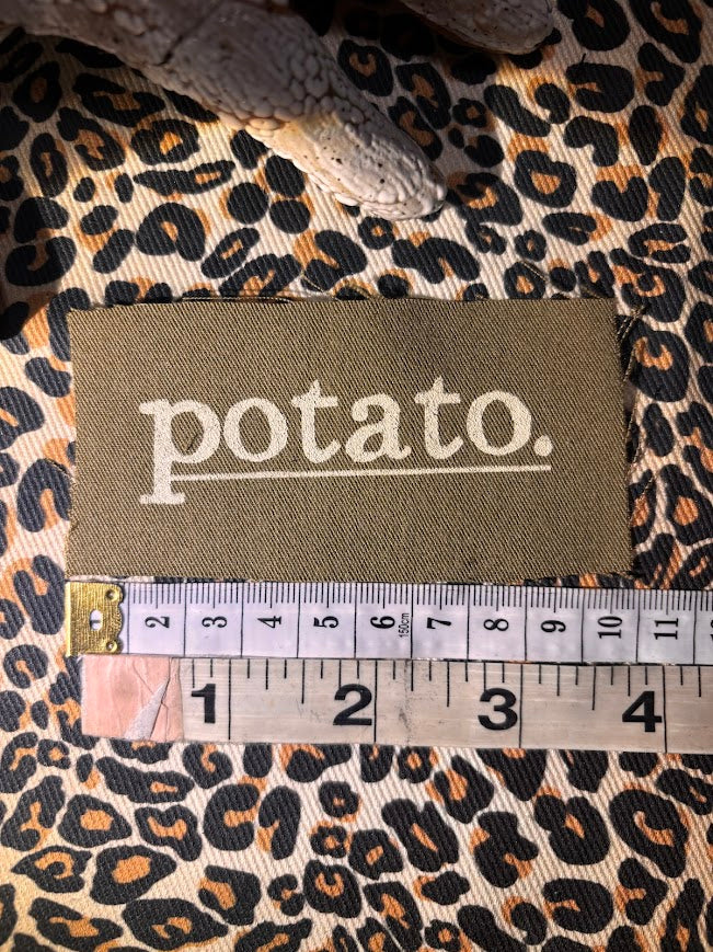 Potato patch. just a tiny patch that says potato