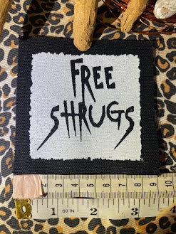 Free Shrugs sew on patch. never mind free hugs, you get free shrugs.