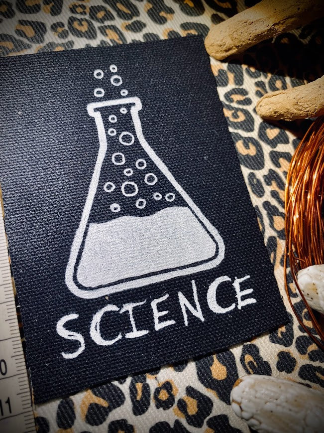 Science! sew on patch featuring bubbling science chemicals