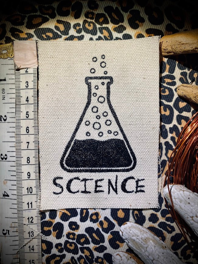 Science! sew on patch featuring bubbling science chemicals