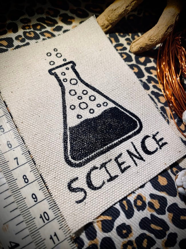 Science! sew on patch featuring bubbling science chemicals