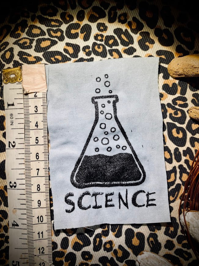 Science! sew on patch featuring bubbling science chemicals