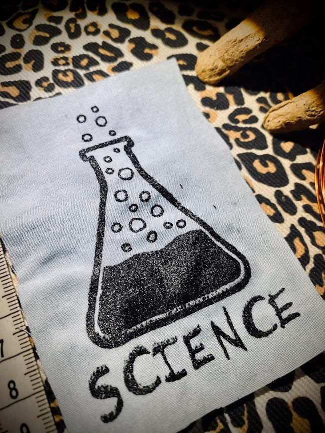 Science! sew on patch featuring bubbling science chemicals