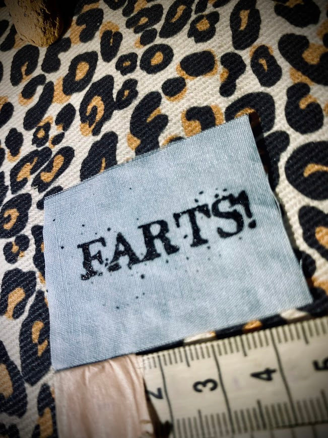 It's a tiny patch that says Farts!  sew one to your butt.