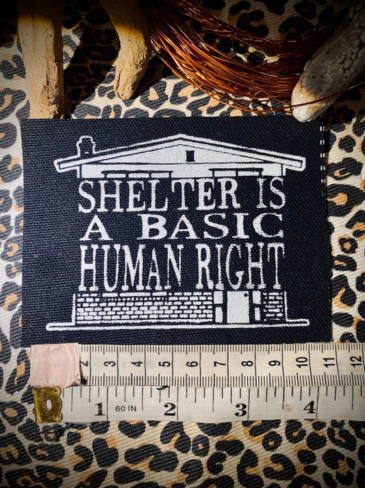 Shelter is a basic human right. sew on patch.